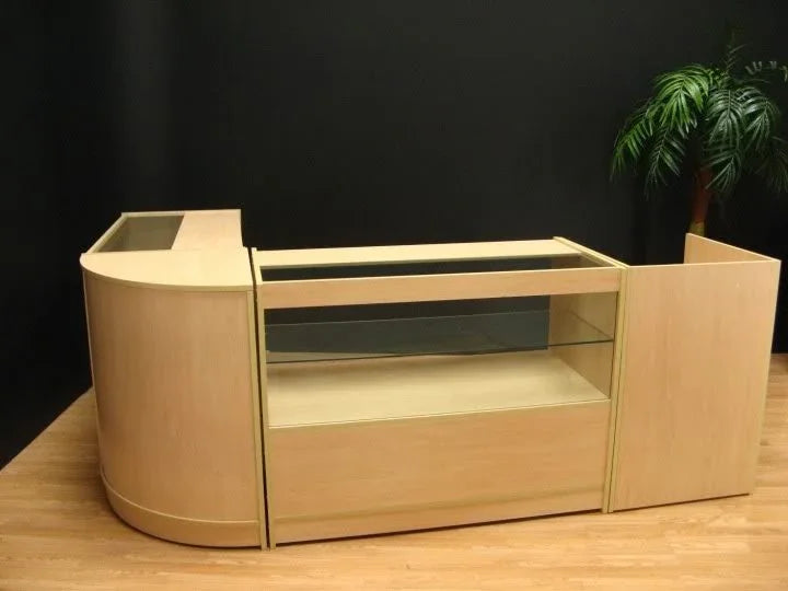 Curved light wood Cosmos Counter Set featuring glass display sections and sleek design, perfect for retail or exhibition spaces