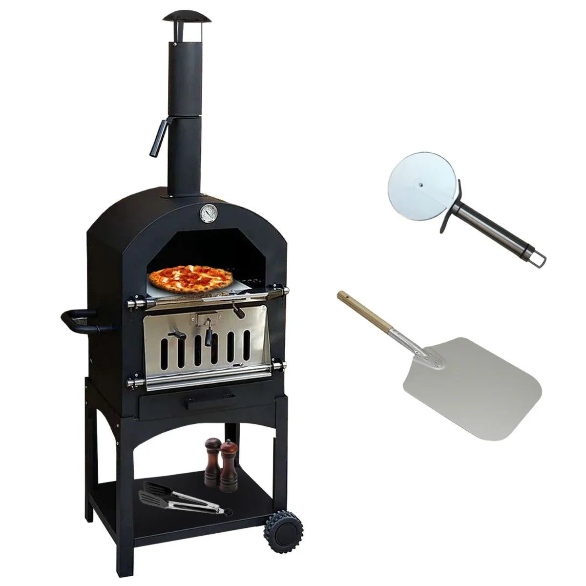 Black KuKoo outdoor pizza oven with a pizza inside, accompanied by a stainless steel pizza peel and grilling tools on a wheeled cart