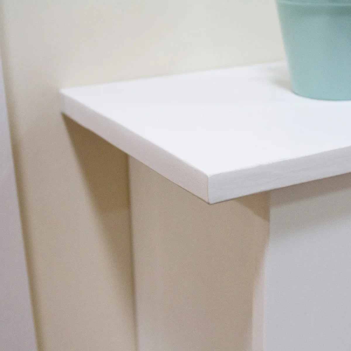 Unfinished MDF radiator cover, 1115mm wide, featuring a smooth white surface and clean edges, perfect for customization and home decor