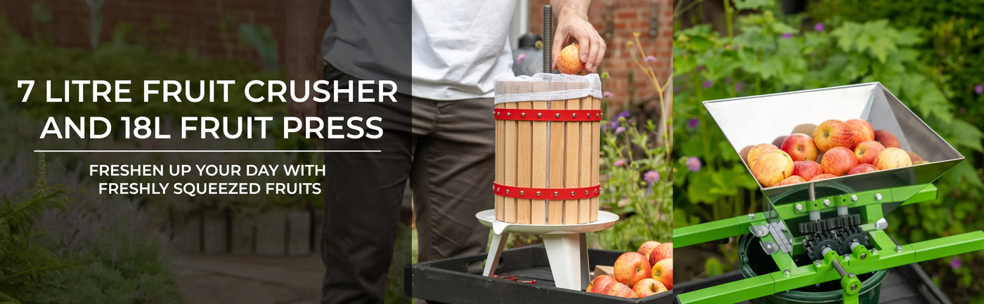 Wooden fruit crusher and green fruit press surrounded by fresh apples, showcasing vibrant colors and rustic textures in a garden setting