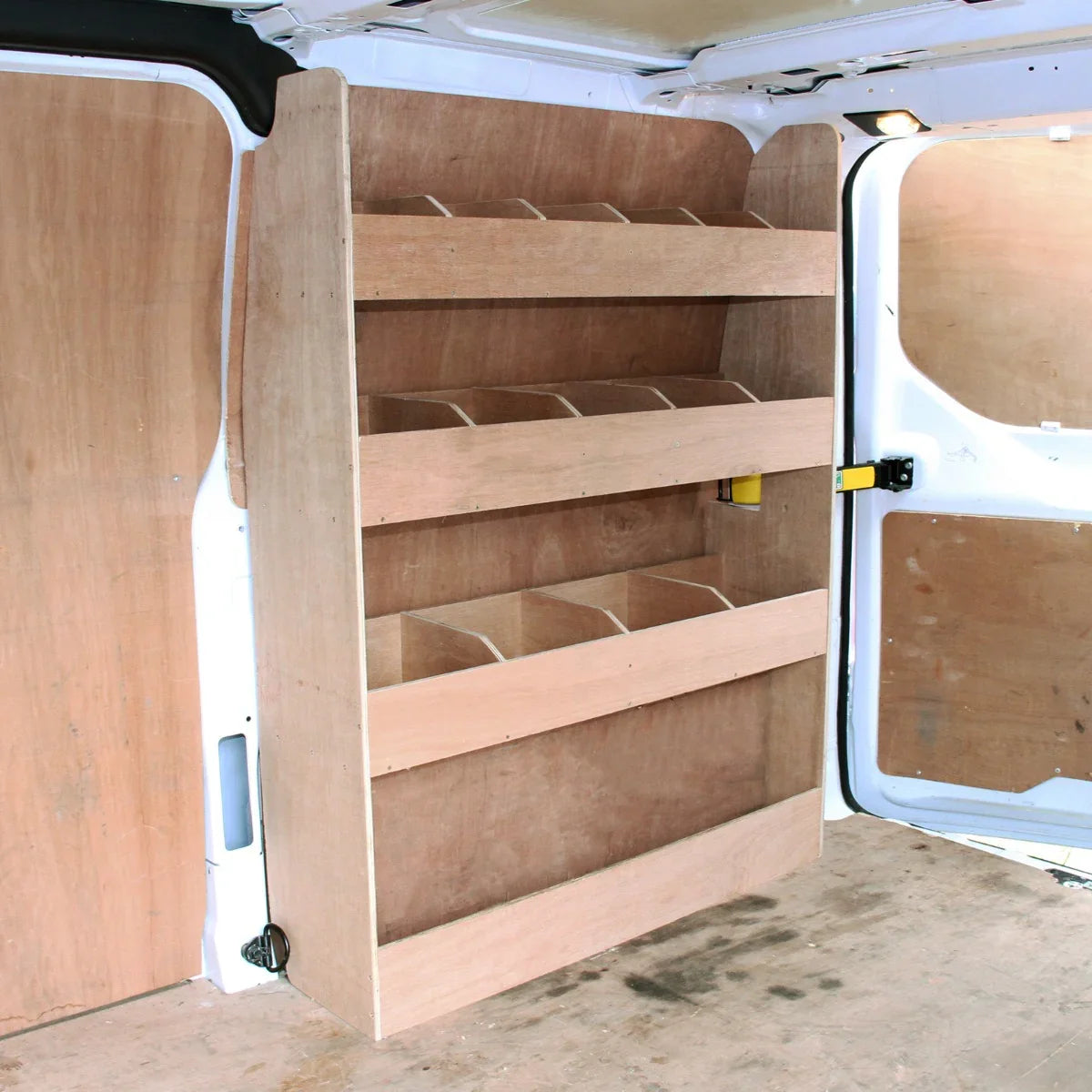 Ford Transit Custom divider racking features a sturdy wooden design with multiple shelves for organized storage, ideal for tools and equipment