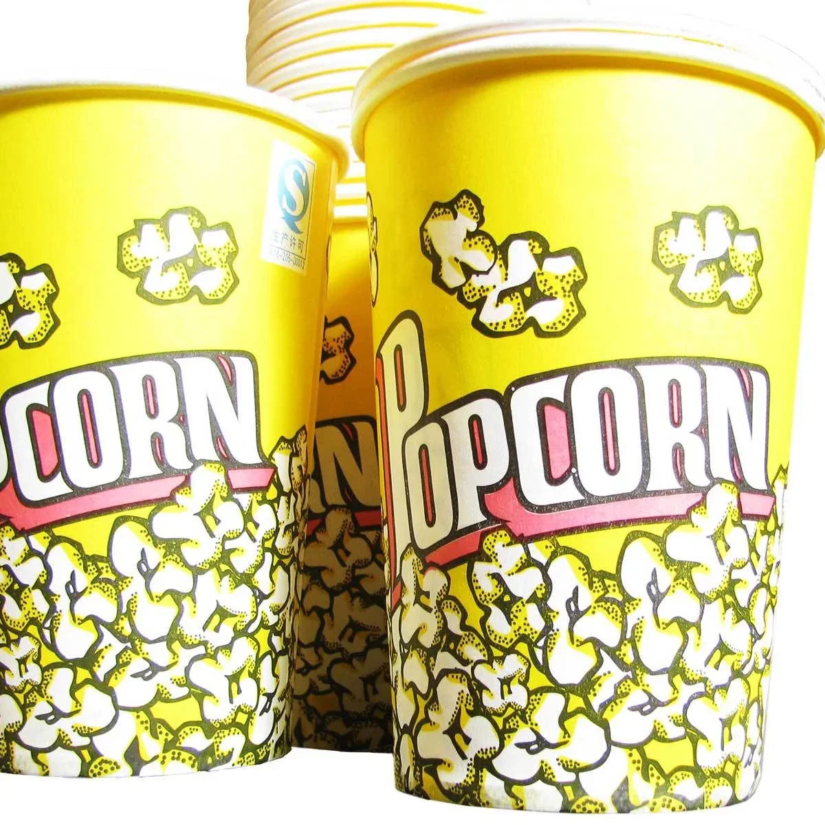 Bright yellow popcorn cartons featuring playful popcorn graphics, perfect for serving 32oz portions at events or movie nights