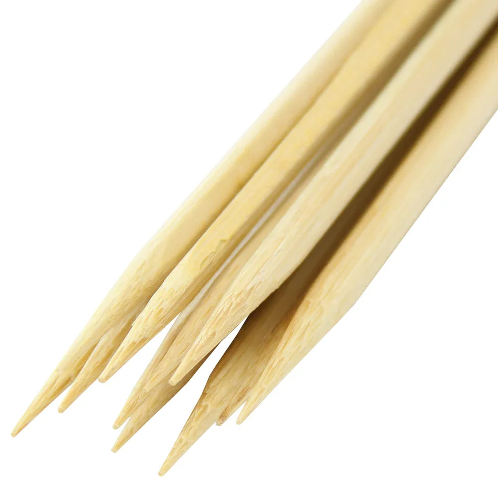 KuKoo wooden candy floss sticks in a pack of 300, featuring smooth, tapered ends and a natural wood finish for easy handling