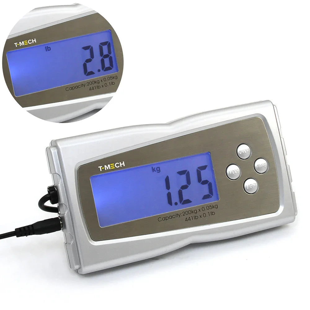 T-Mech Heavy Duty Postal Scales with a large blue LCD display showing weight in pounds and kilograms, sleek silver casing