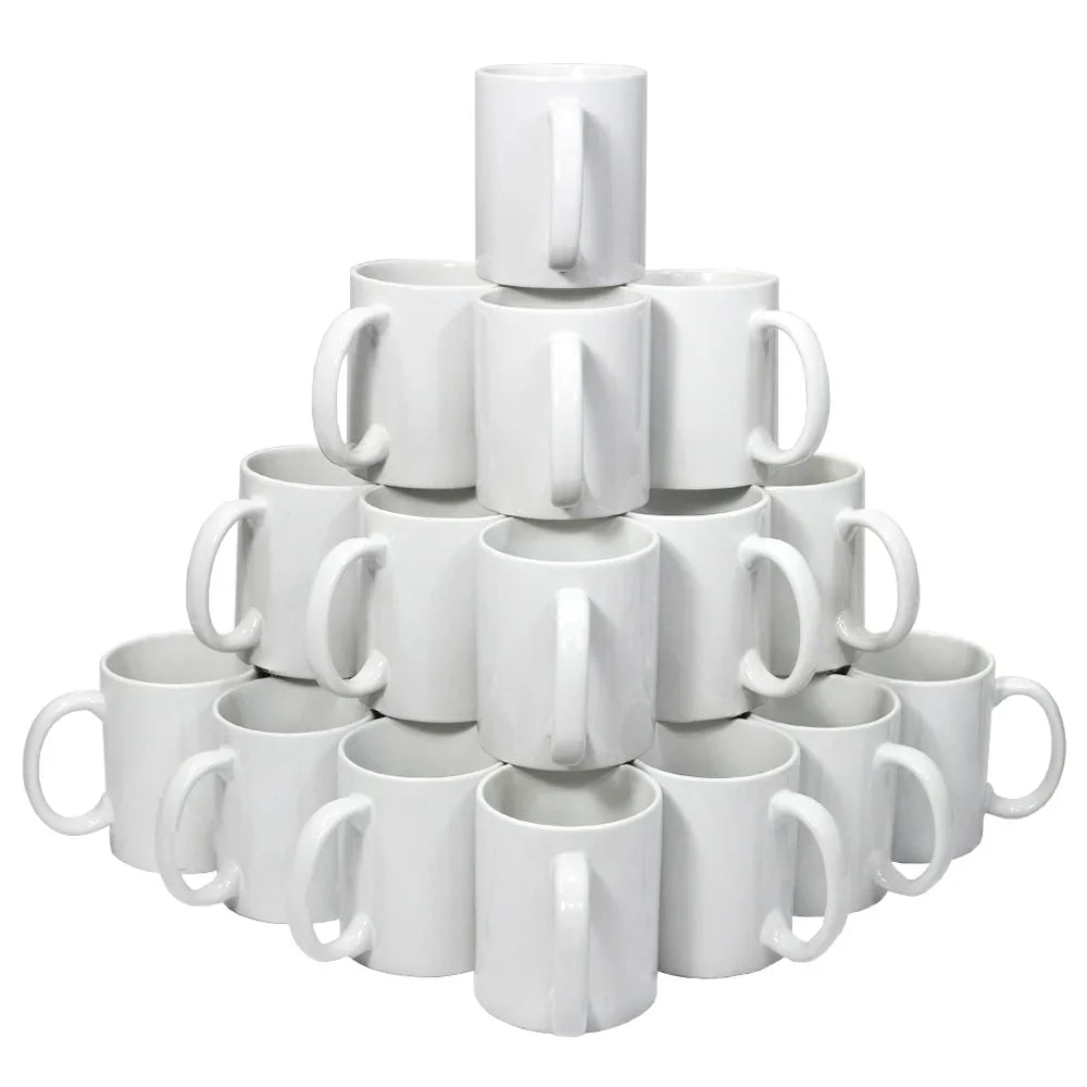 Stacked pyramid of plain white ceramic mugs with large handles, 11oz size.