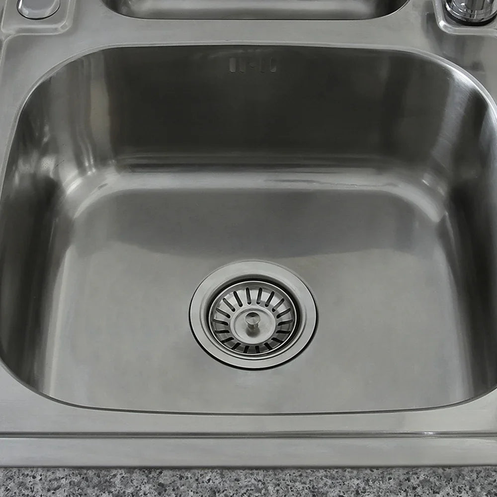 Premium stainless steel kitchen sink with a polished finish, featuring a central drain and sleek, modern design on a granite countertop