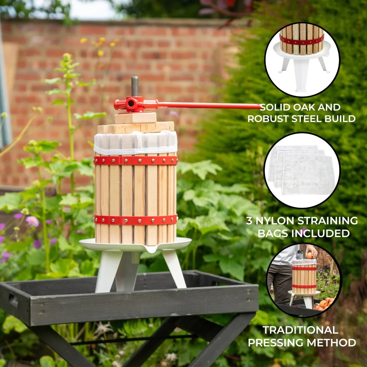 KuKoo 12 Litre Fruit Press with solid oak and steel construction, red accents, and three nylon straining bags for easy juicing