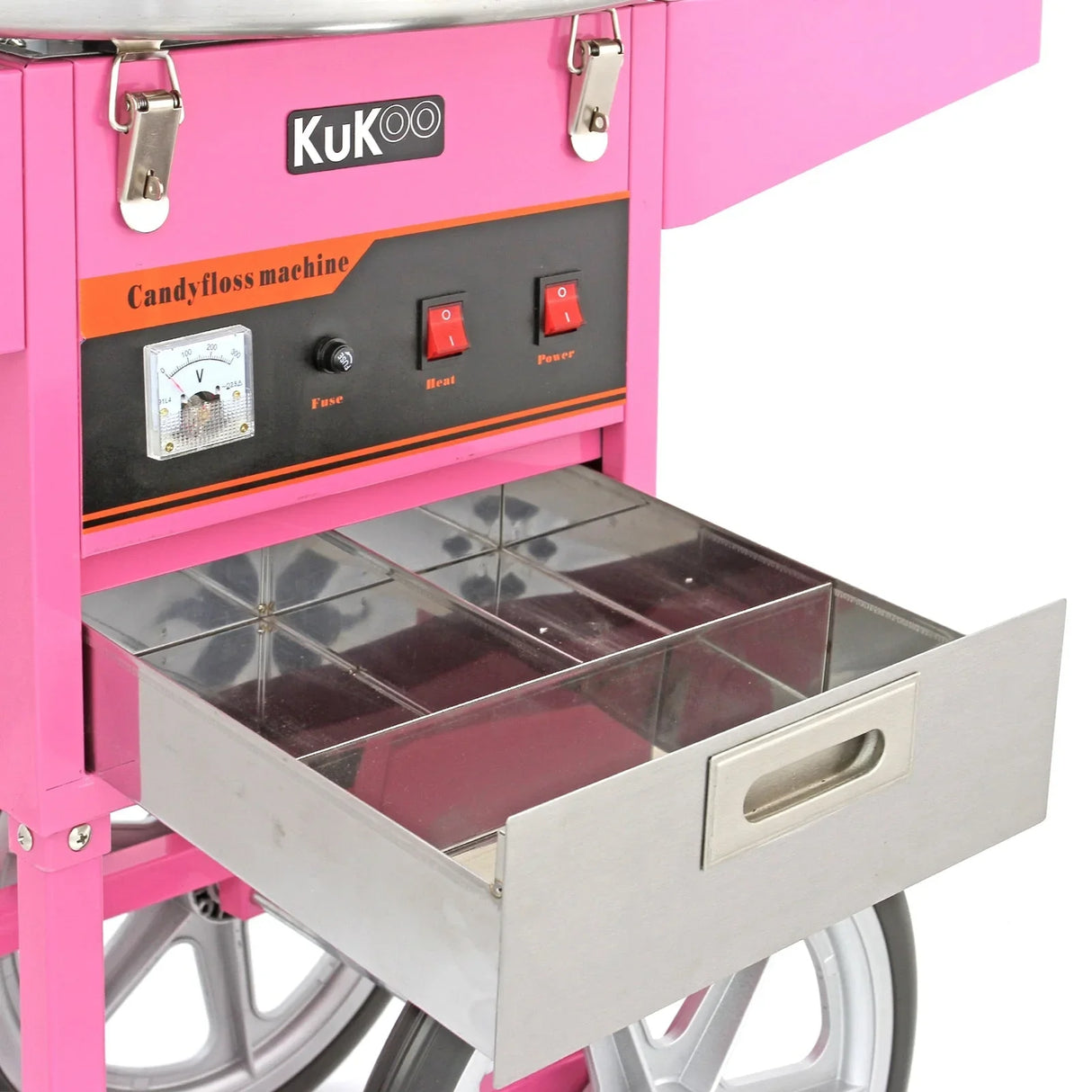 Bright pink KuKoo candy floss machine with cart, featuring a stainless steel drawer, control panel, and large wheels for mobility