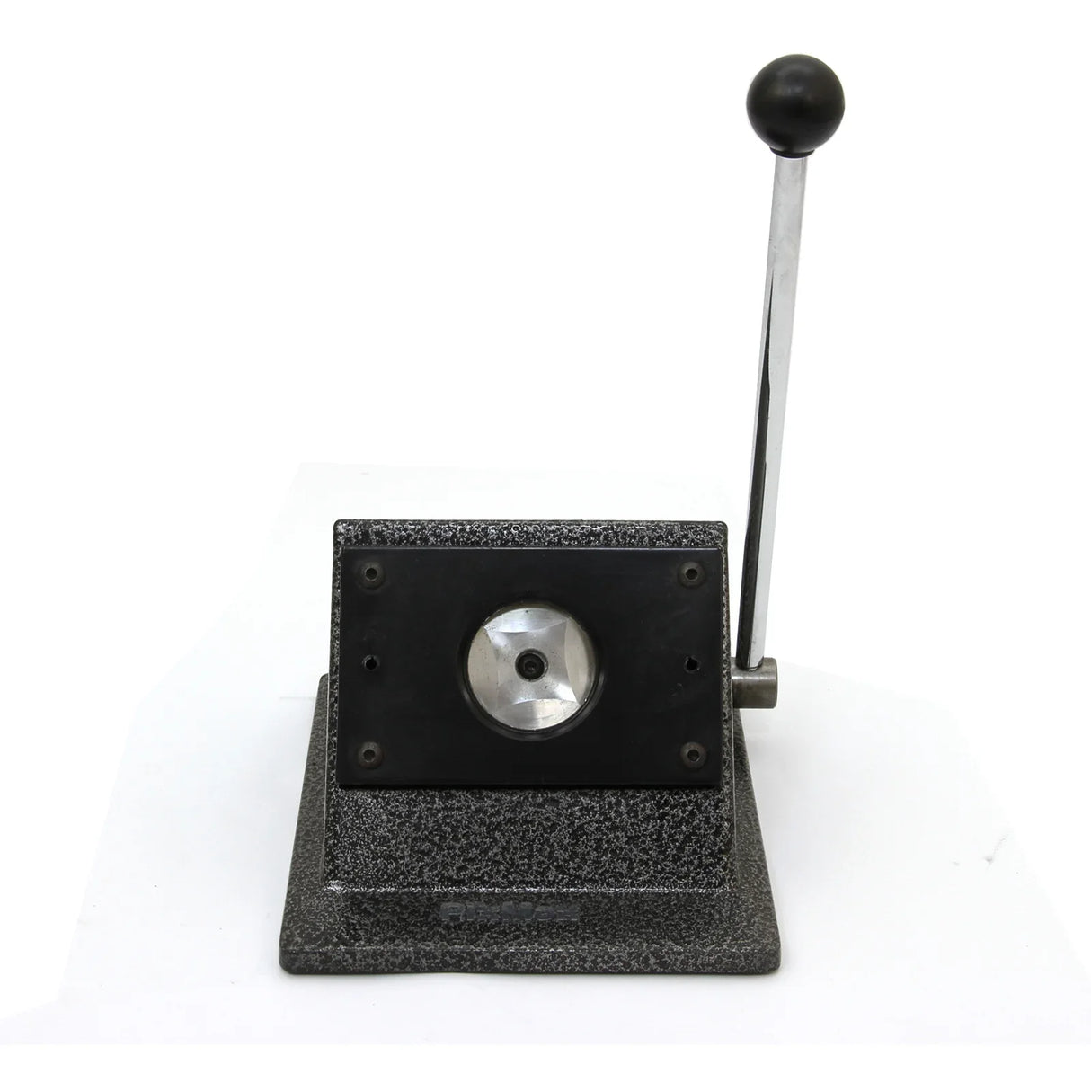 Heavy-duty badge maker with a textured black base, silver lever, and circular cutting area for precise badge creation