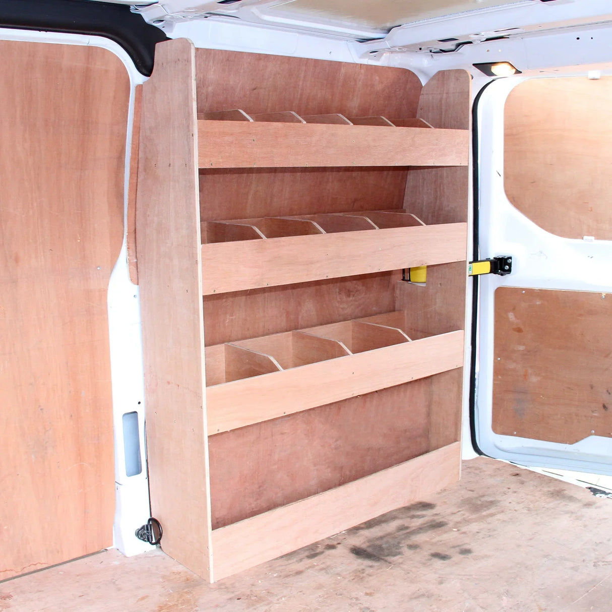Anthracite van lining with a wooden rack featuring five open shelves, designed for Ford Transit Custom, showcasing a...