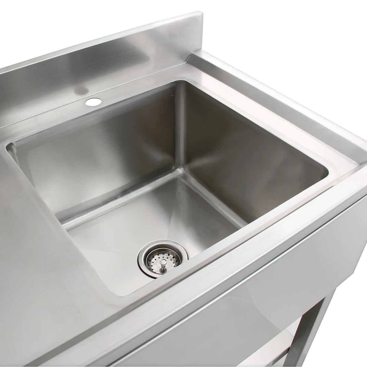Commercial stainless steel sink with left-hand drainer, featuring a polished finish, square basin, and central drain hole for efficient water flow