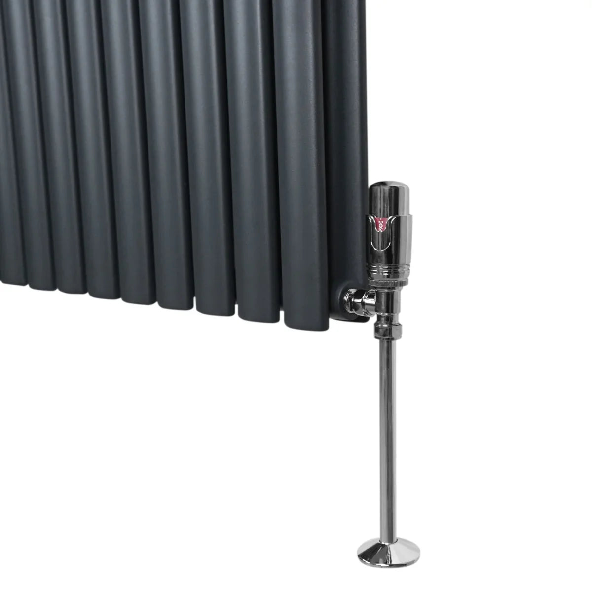 Oval column radiator in anthracite grey, featuring sleek vertical tubes and a polished chrome valve for modern heating solutions