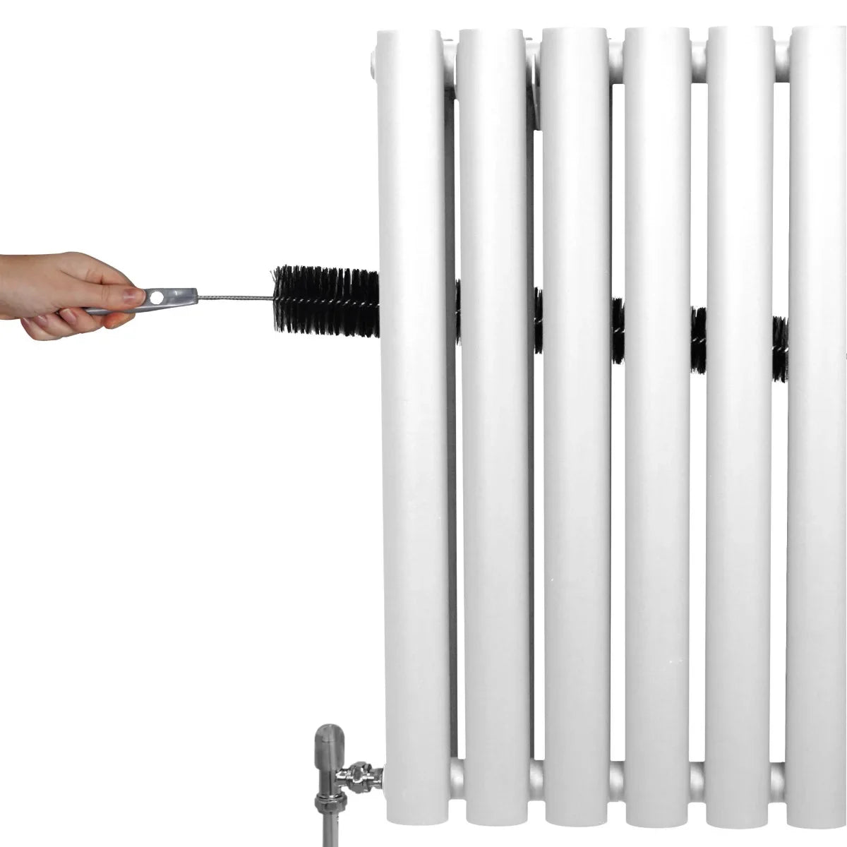 White oval column radiator with six vertical panels, showcasing a hand adjusting the valve for temperature control