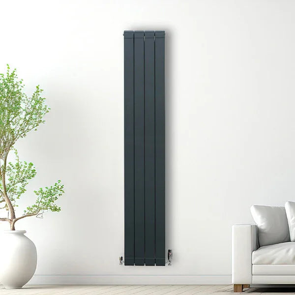 Anthracite grey aluminium radiator, 1800mm x 315mm, sleek vertical design mounted on a white wall with a modern living space backdrop