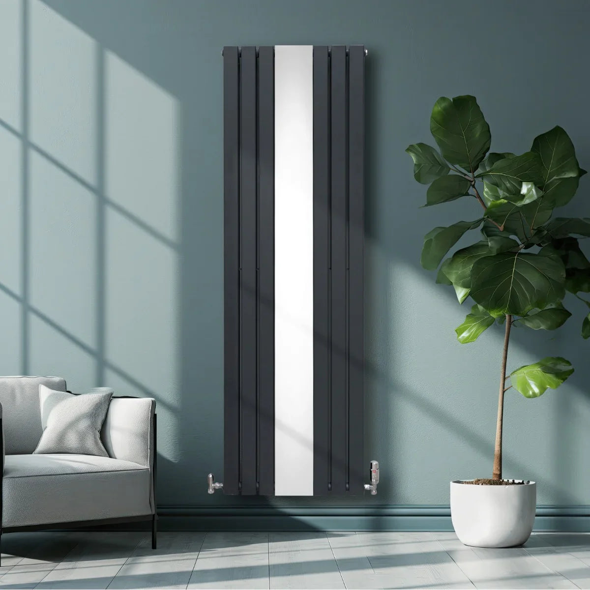 Flat mirror radiator in anthracite grey, 1800mm x 565mm, featuring sleek vertical lines, mounted on a wall beside a potted plant