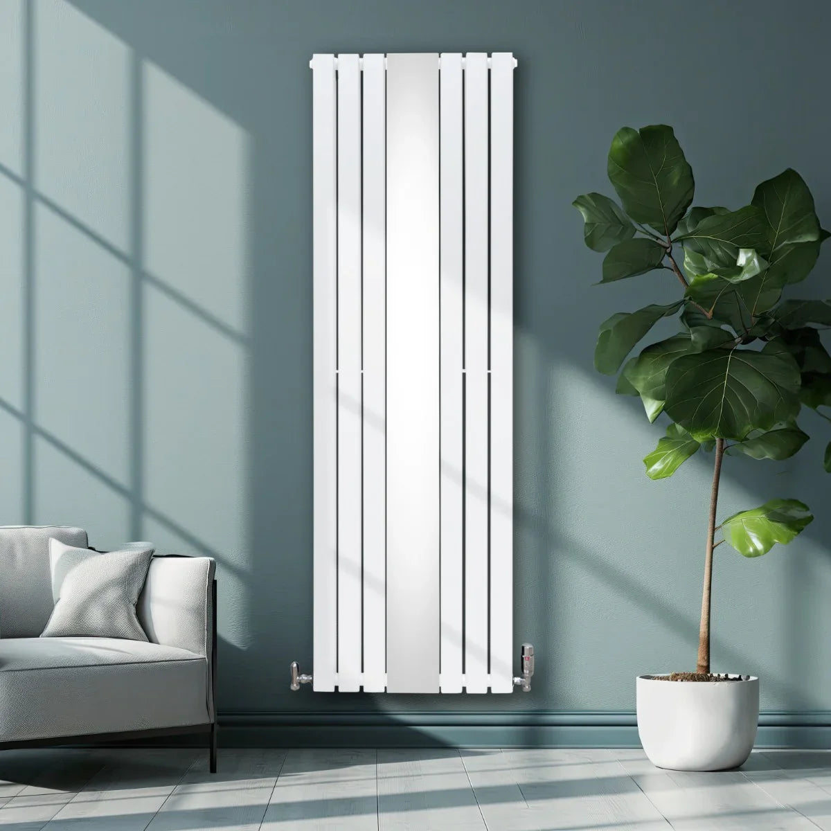 Sleek white flat mirror radiator measuring 1800mm x 565mm, mounted on a wall beside a modern sofa and potted plant in a stylish room