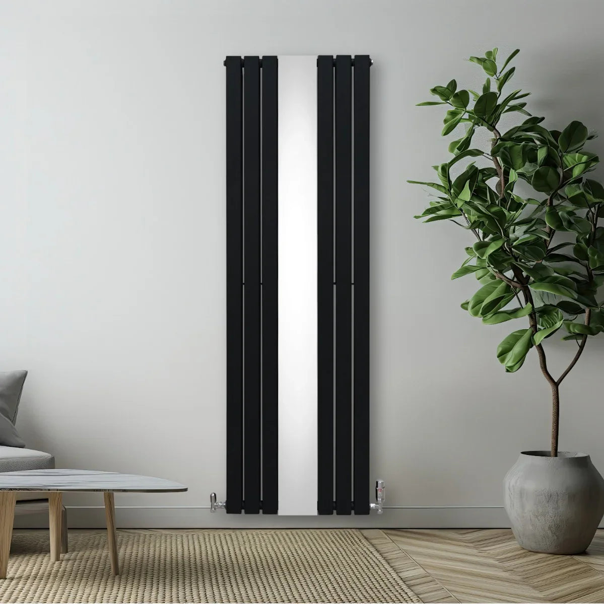 Sleek black flat mirror radiator with vertical slats, measuring 1800mm x 565mm, mounted on a light wall beside a potted plant