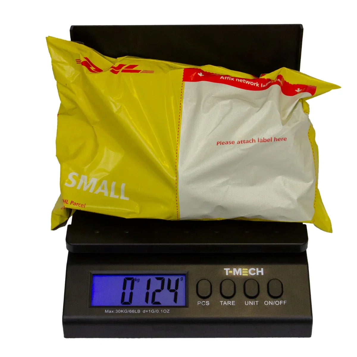 T-Mech digital postal scales displaying a yellow parcel labeled 'SMALL' weighing 0.124 kg on a sleek black platform