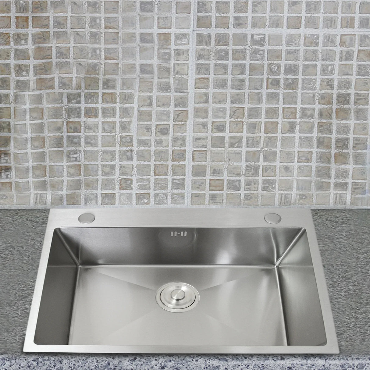 KuKoo single stainless steel sink with a polished finish, featuring a square shape and a central drain, set against a mosaic tile backdrop