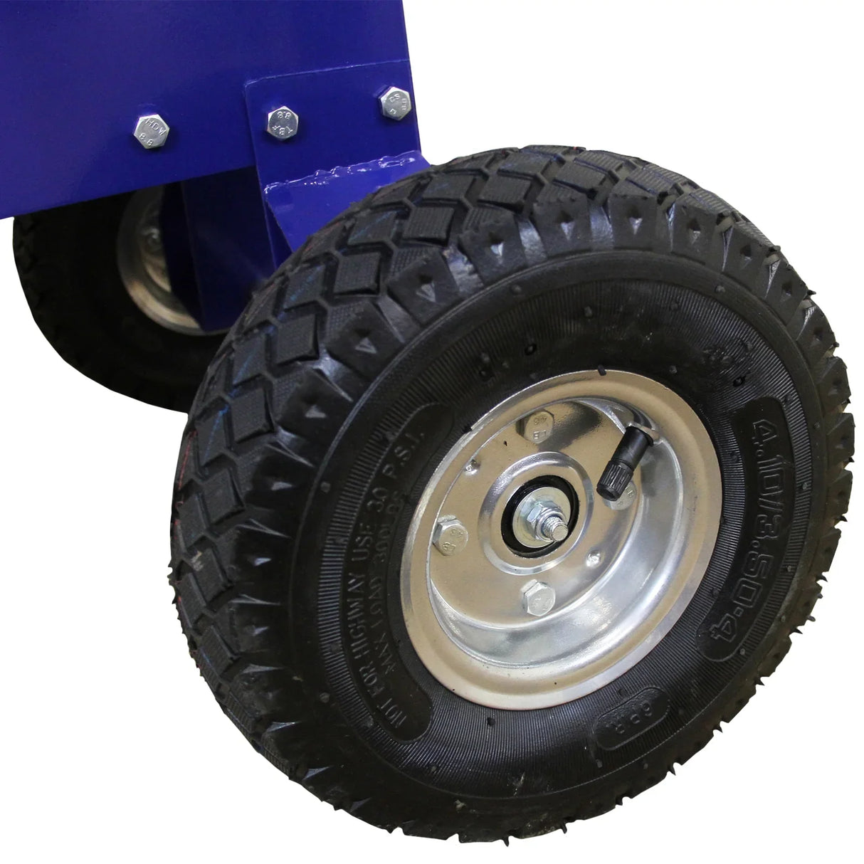 Durable rubber tire of the T-Mech 15HP Wood Chipper, featuring a rugged tread pattern for stability and easy maneuverability