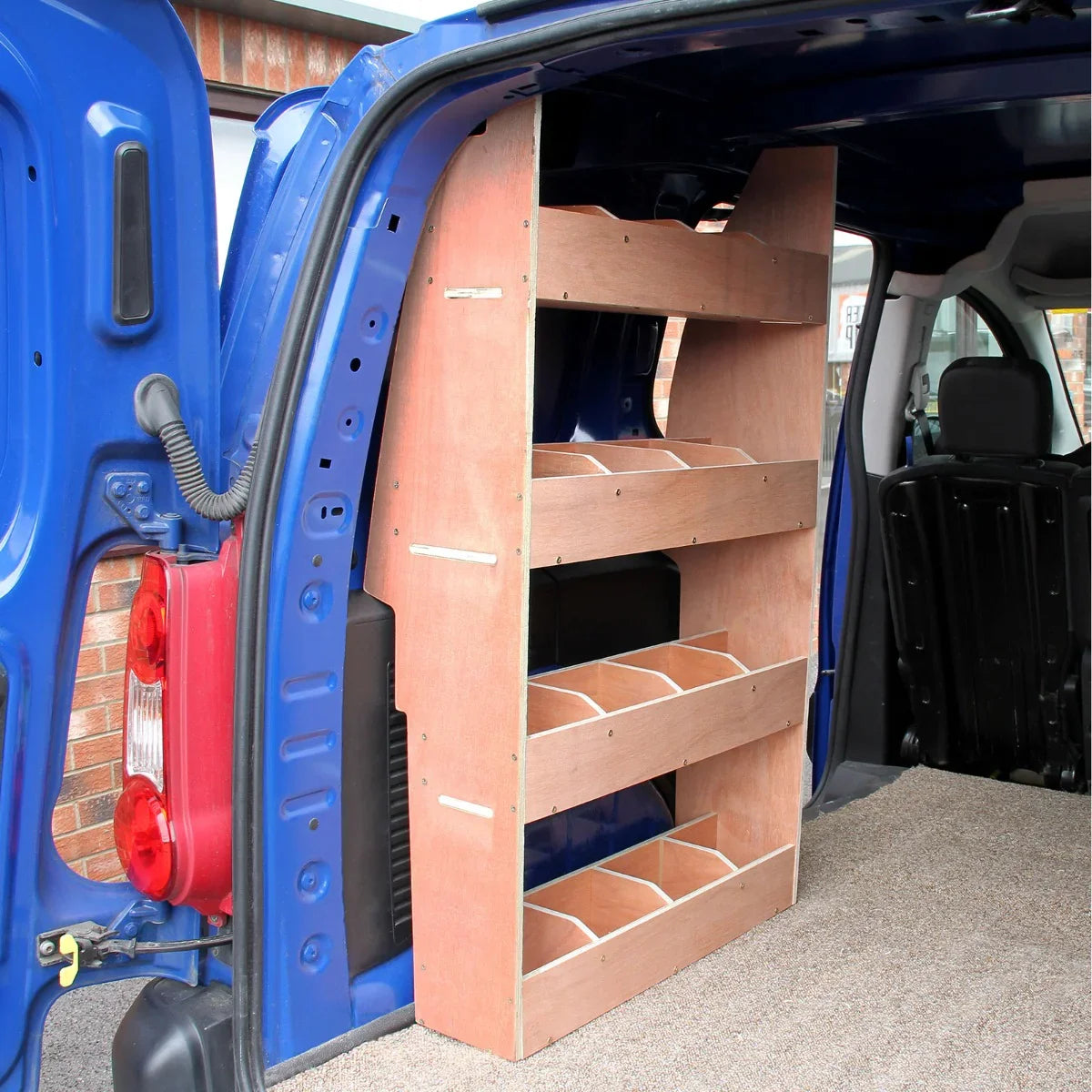 Wheat van lining and Citroen Berlingo racking unit with wooden shelves, fitted inside a blue van for organized storage