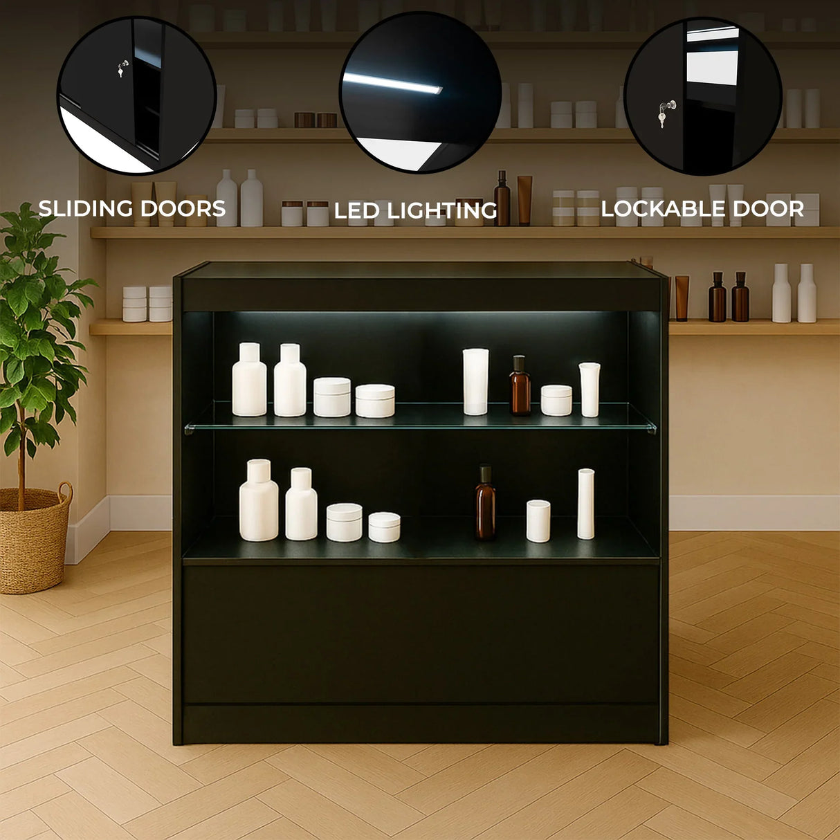 Black LED retail shop counter C900 with sliding doors, lockable design, and illuminated shelves showcasing white display bottles