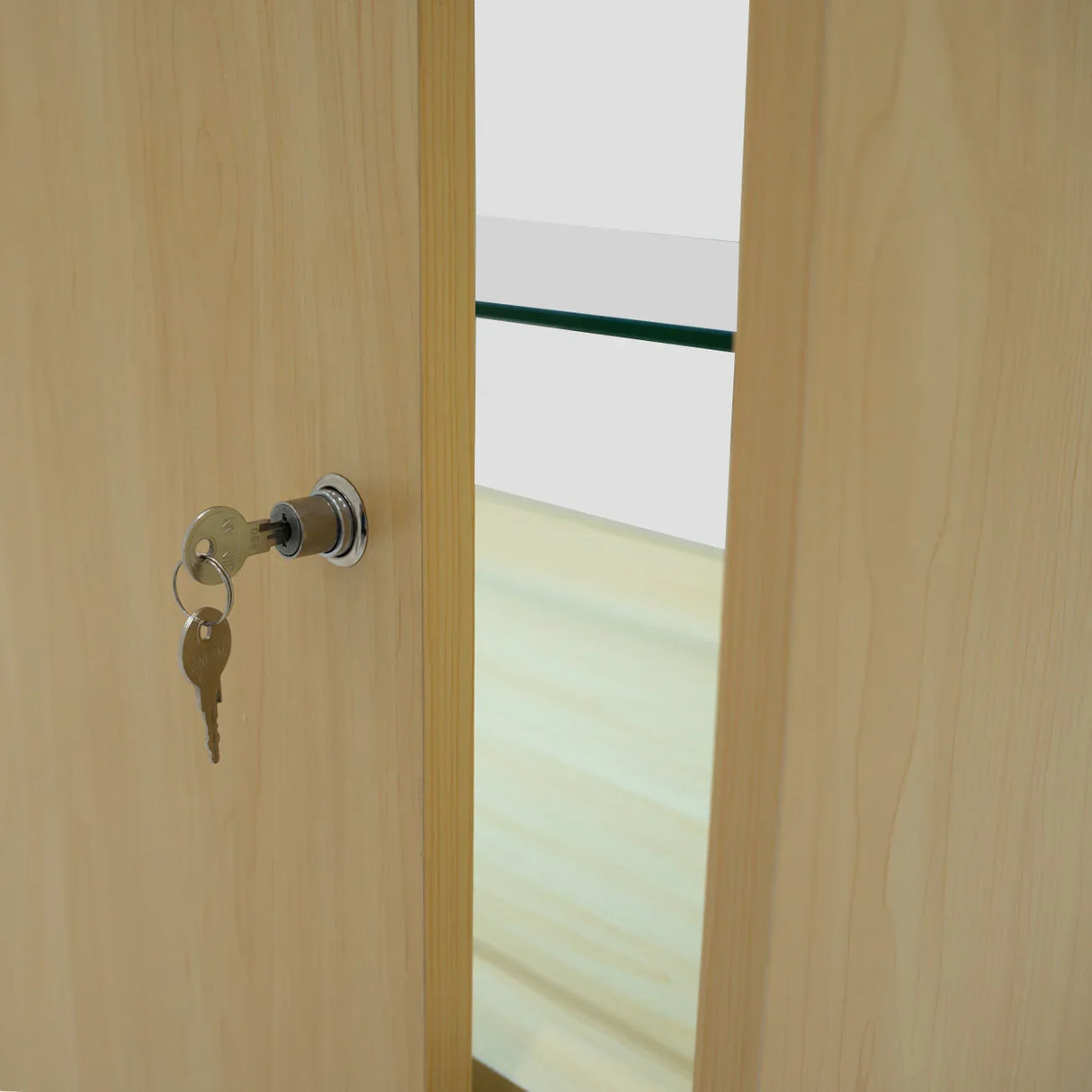 Maple LED retail shop counter C900 with a key lock, showcasing smooth wood grain and a glass shelf inside the cabinet