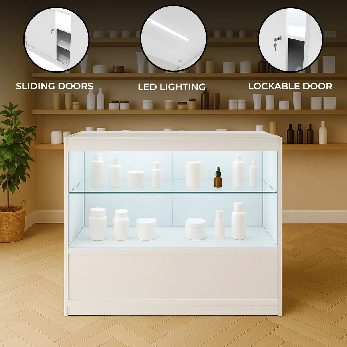 White LED retail shop counter C900 with sliding doors, lockable door, and illuminated shelves showcasing various white containers