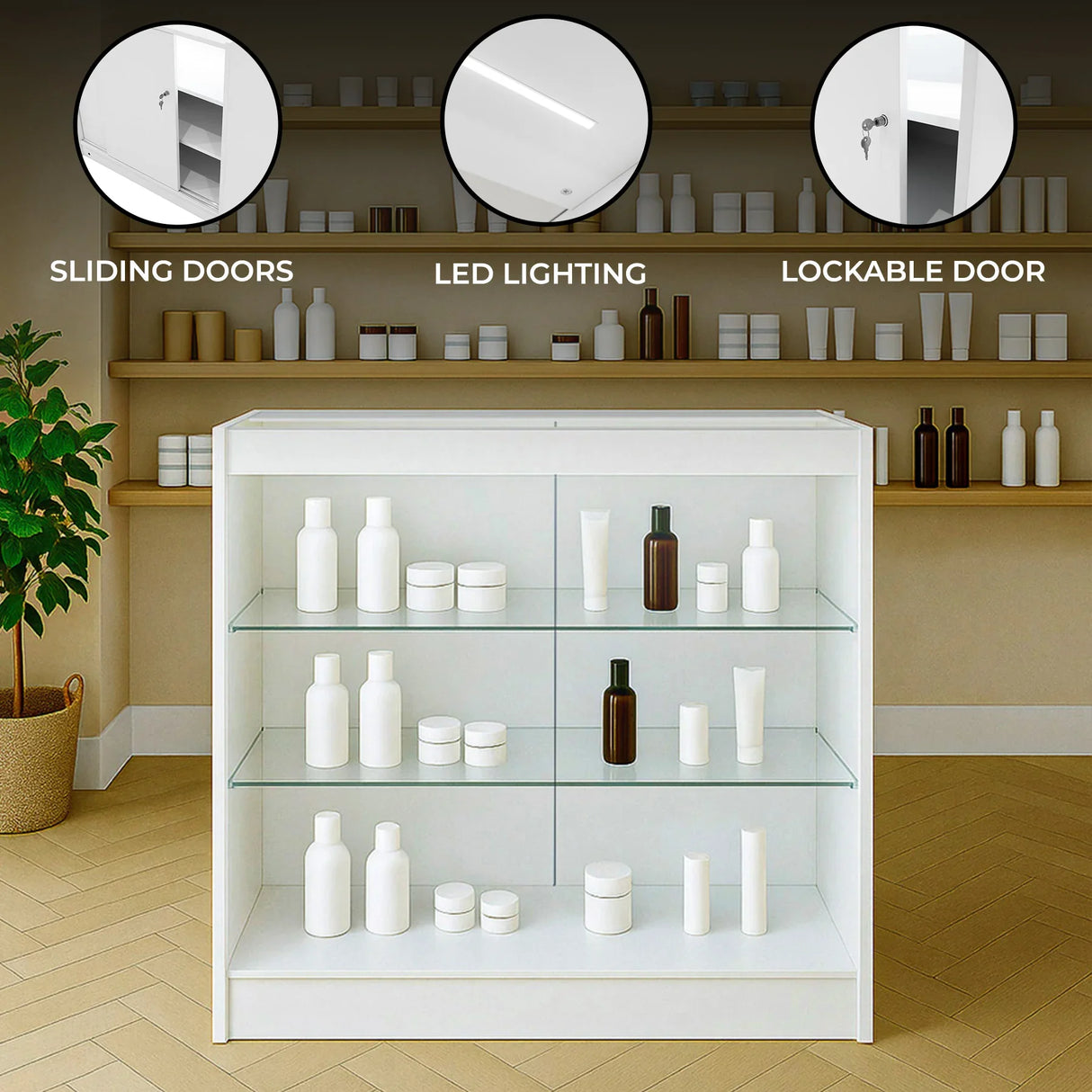 White LED retail shop counter K900 with sliding doors, glass shelves, and lockable door, showcasing various beauty products