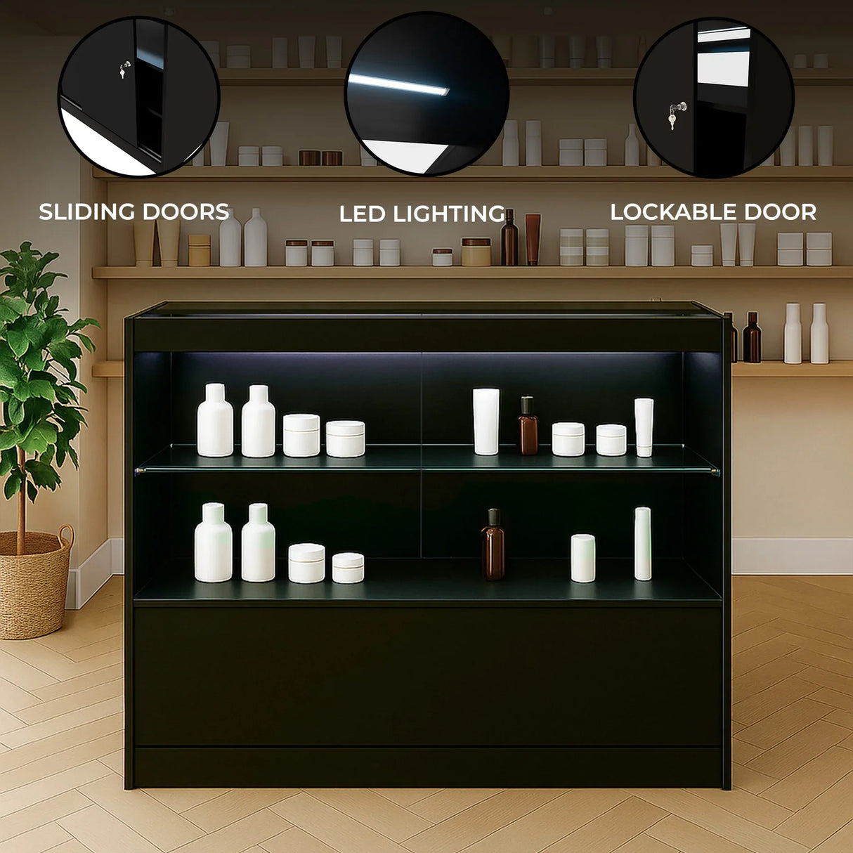 Black LED retail shop counter with sliding doors, lockable door, and illuminated shelves displaying various white containers