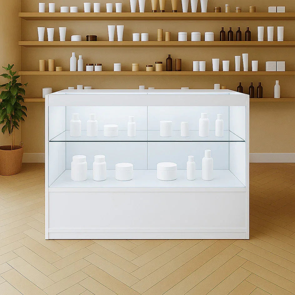 LED retail shop counter in white, featuring glass shelves displaying various white containers, set against a warm, minimalist background