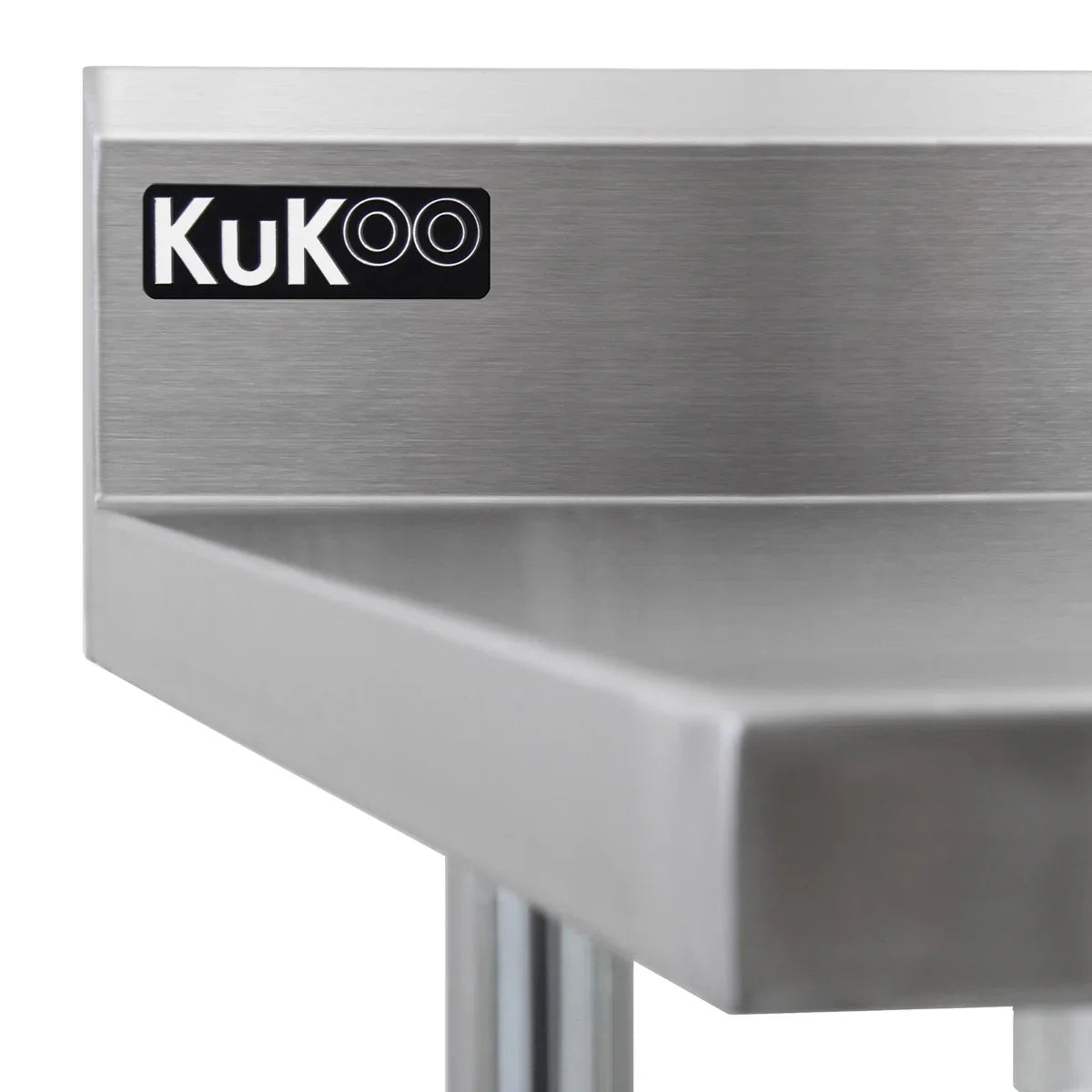 Stainless steel catering table edge with a smooth finish, featuring a KuKoo logo, showcasing durability and professional design