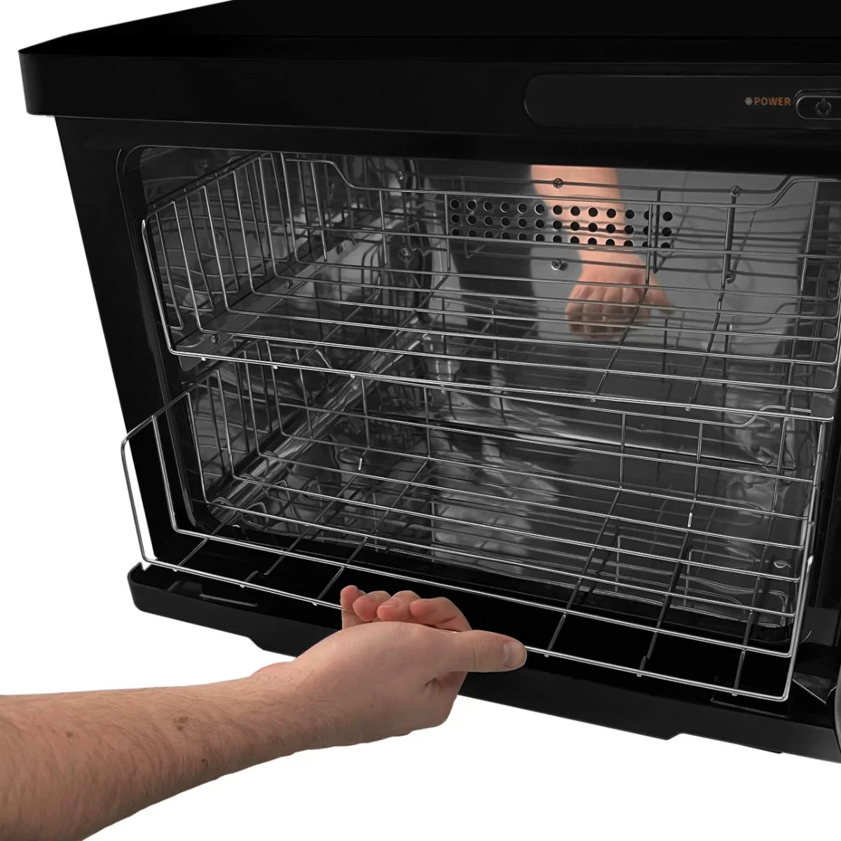 Black hot towel warmer with stainless steel racks, featuring a sleek design and spacious interior for even heating of towels