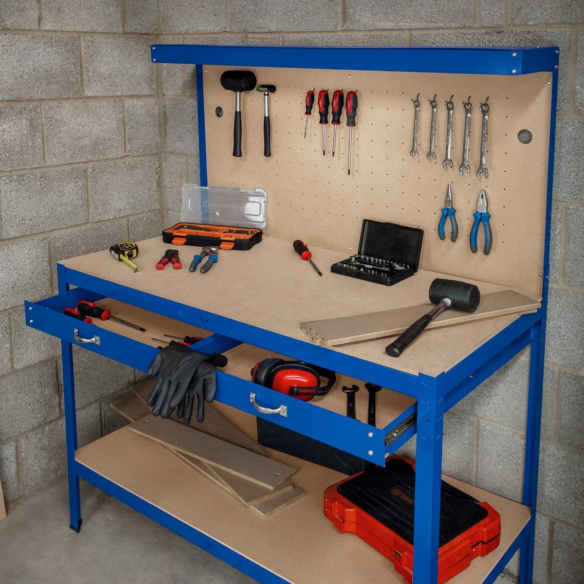 Blue workbench with pegboard, tools, drawer, and overhead light, featuring a sturdy design and organized workspace for projects