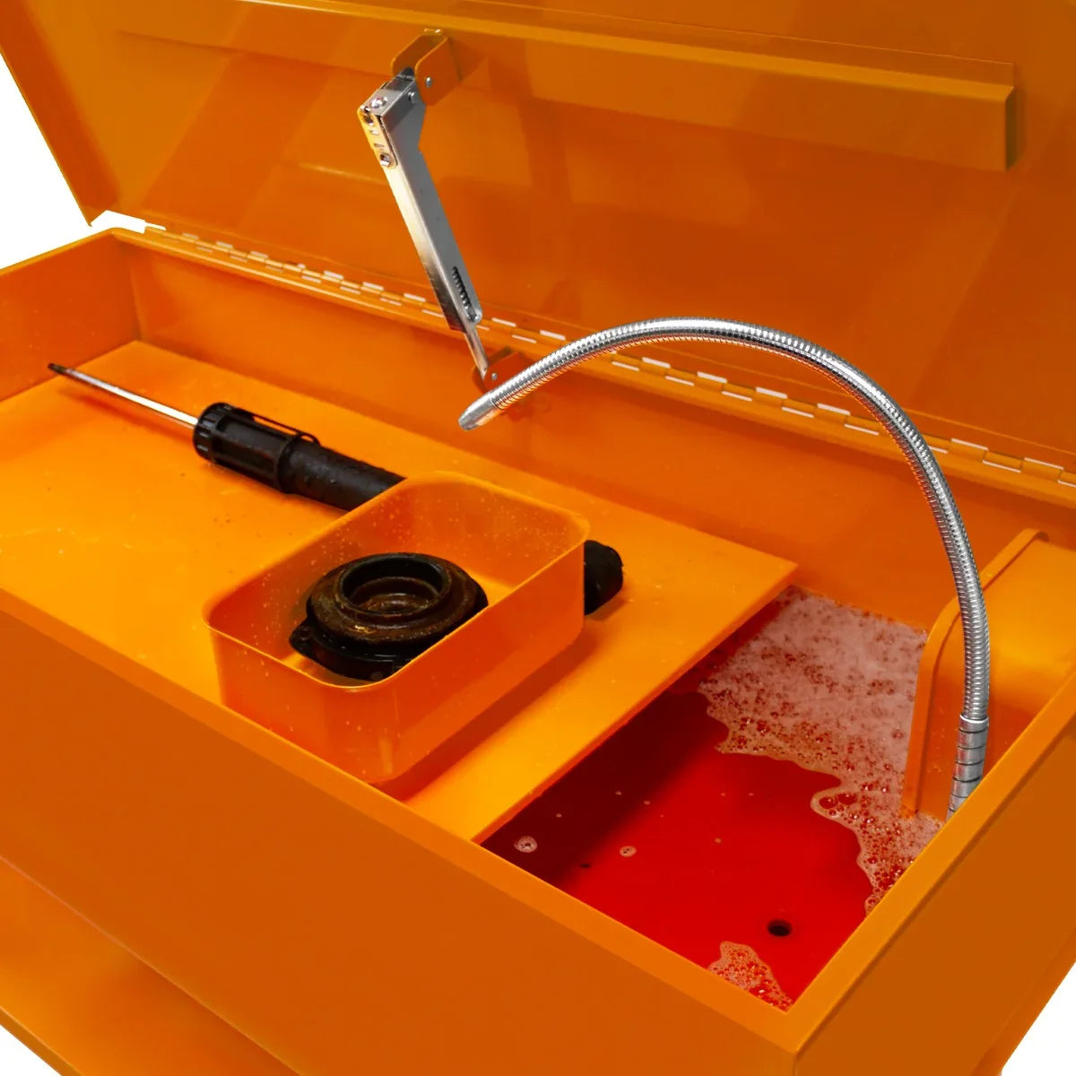 40-gallon parts washer with bright orange finish, featuring a removable tray, flexible nozzle, and soapy water for cleaning parts