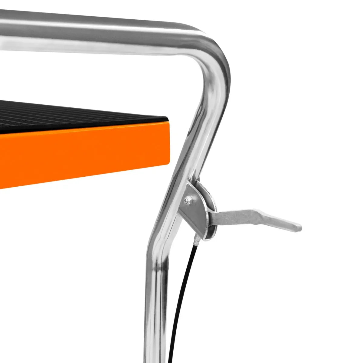 Hydraulic table lift with a sleek chrome frame, orange edge detail, and textured black surface for stability and grip