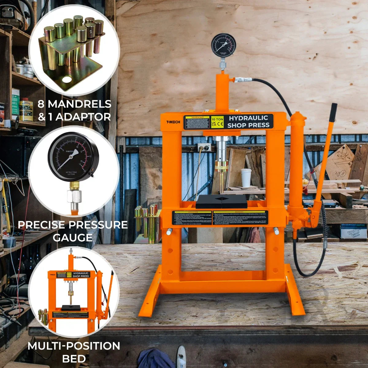 Hydraulic shop press with gauge, featuring an orange frame, multi-position bed, and eight mandrels with an adaptor on a workshop table