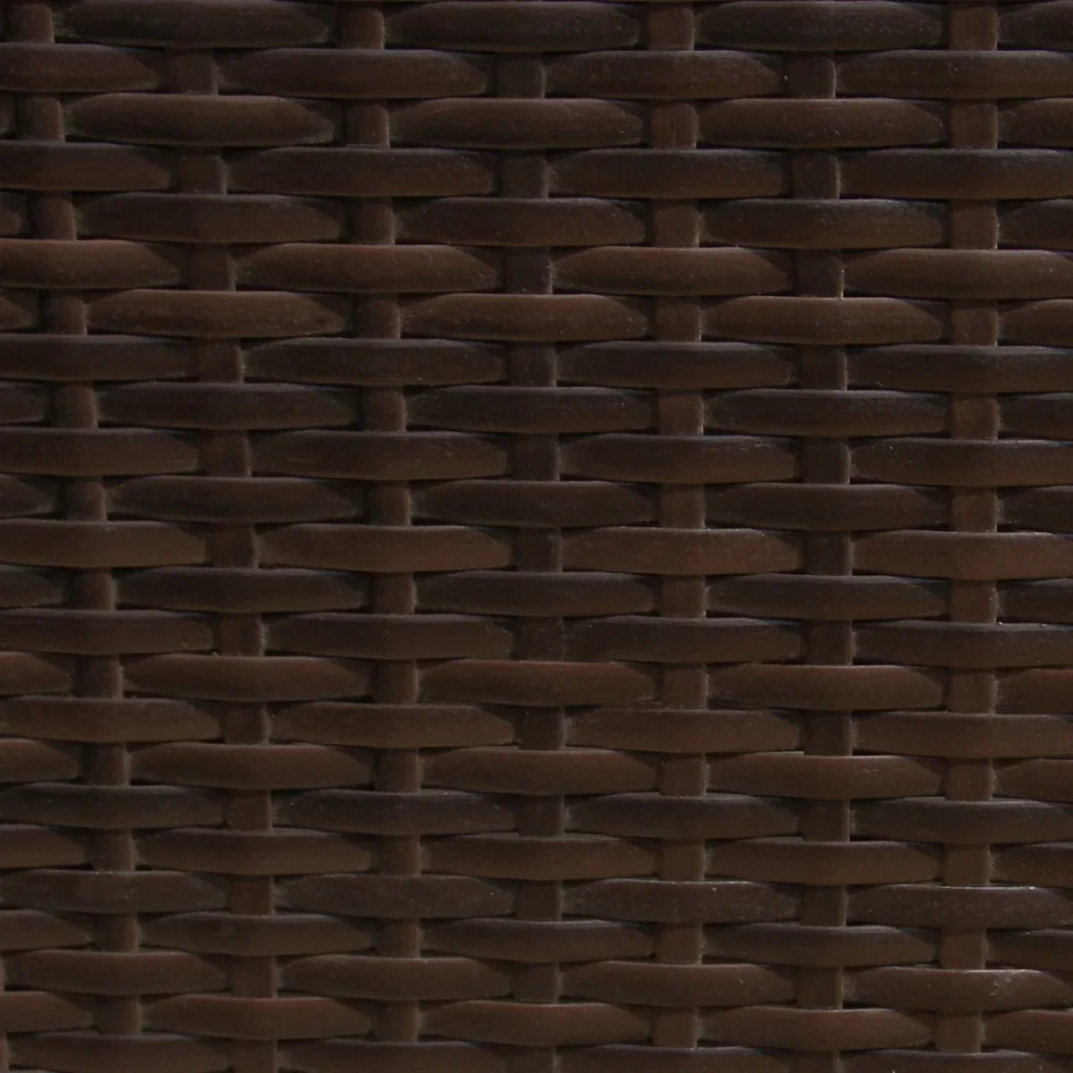 Close-up of the textured brown rattan weave, showcasing the intricate pattern and durable material of the corner set