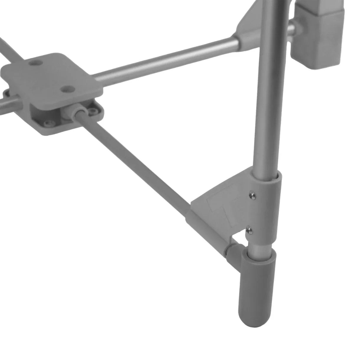 Close-up of the adjustable leg mechanism of a heated clothes airer, showcasing its sturdy gray plastic and metal construction