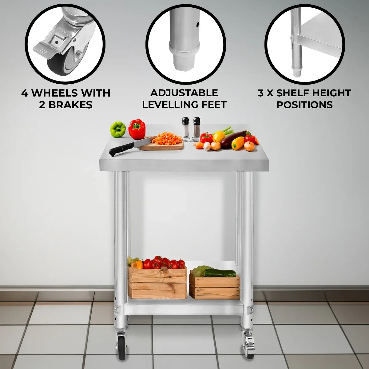 KuKoo Work Table with a stainless steel top, adjustable height, 4 wheels, and 2 brakes, featuring fresh vegetables on the surface