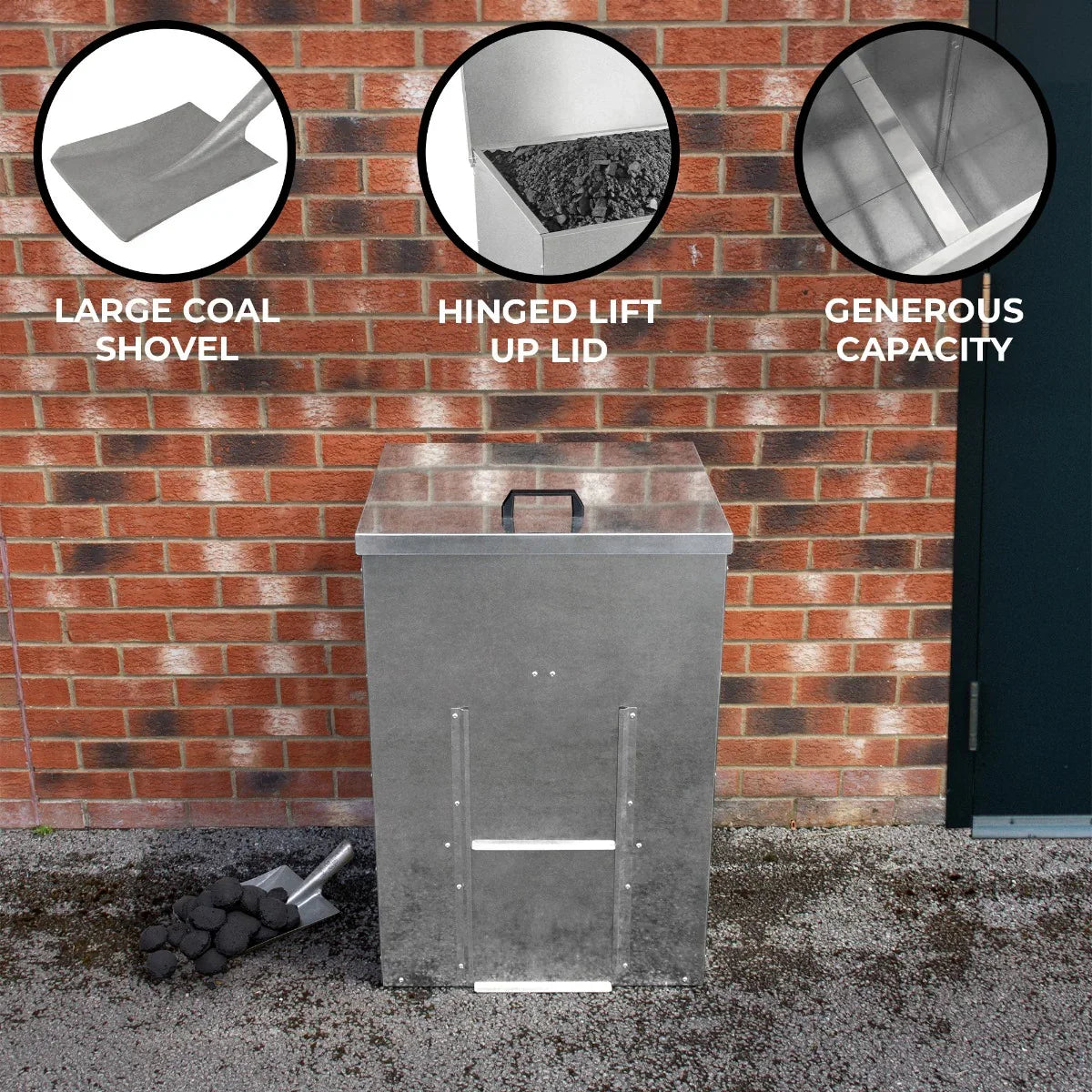 Galvanised coal bunker with a hinged lid, large capacity, and a shovel, set against a brick wall for outdoor coal storage
