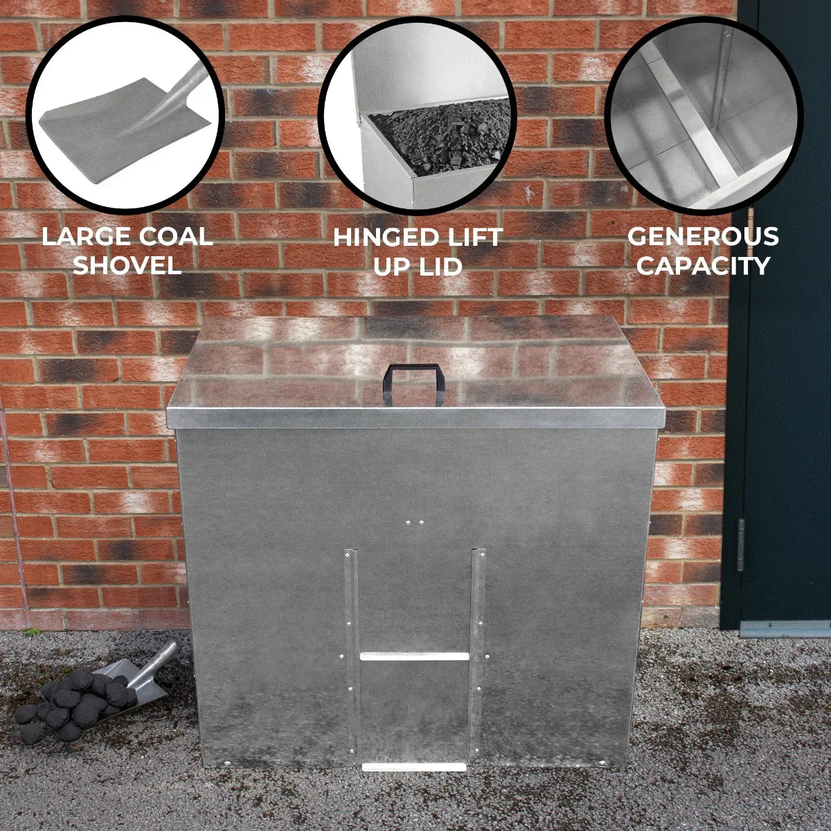 Galvanised coal bunker with a hinged lid, large shovel, and generous capacity, set against a brick wall for outdoor use