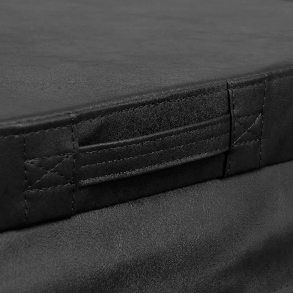 Durable black hot tub spa cover with textured surface and reinforced edges, designed for 2m spa protection and insulation