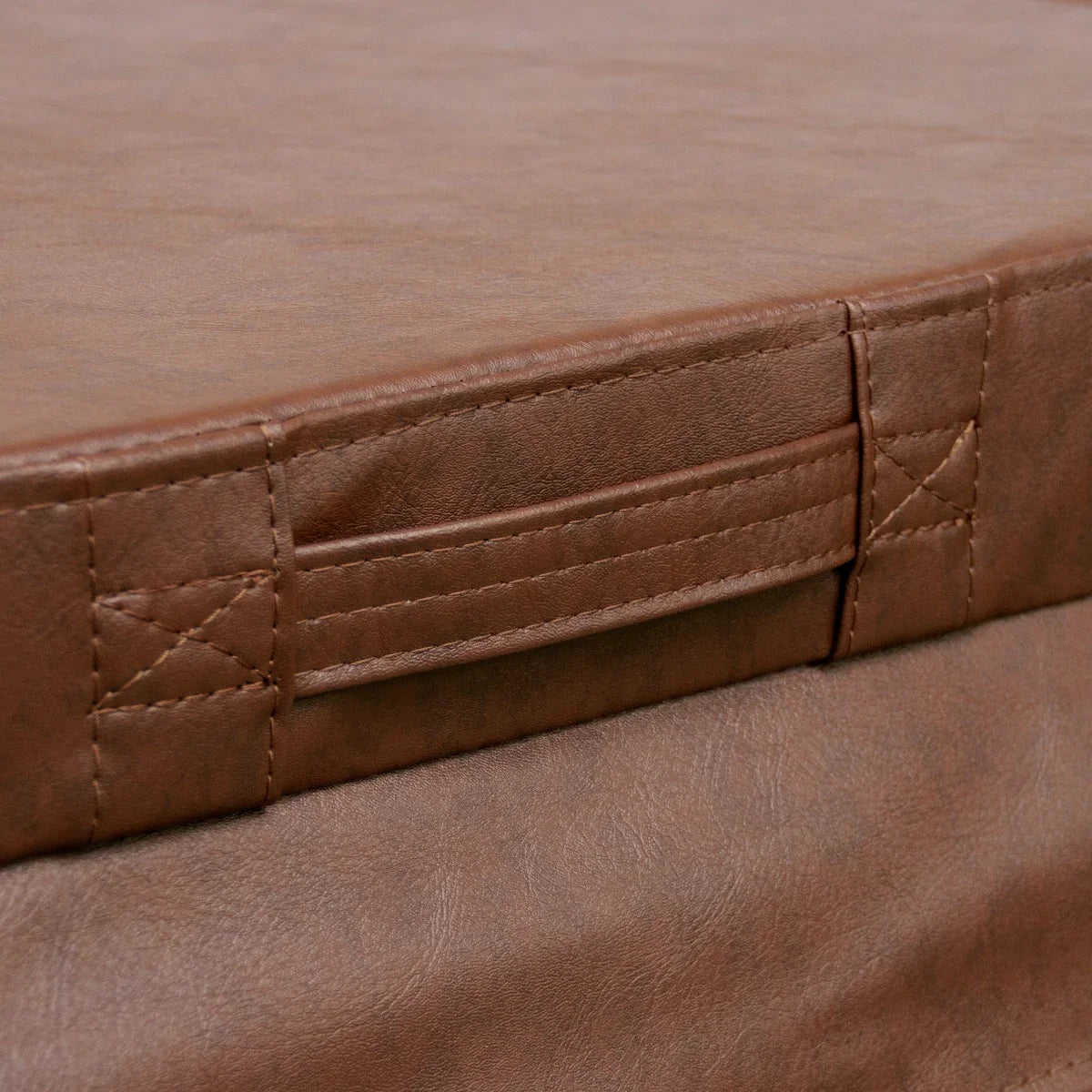 Brown 2.2m hot tub spa cover featuring a textured, durable surface and sturdy side handles for easy removal and placement