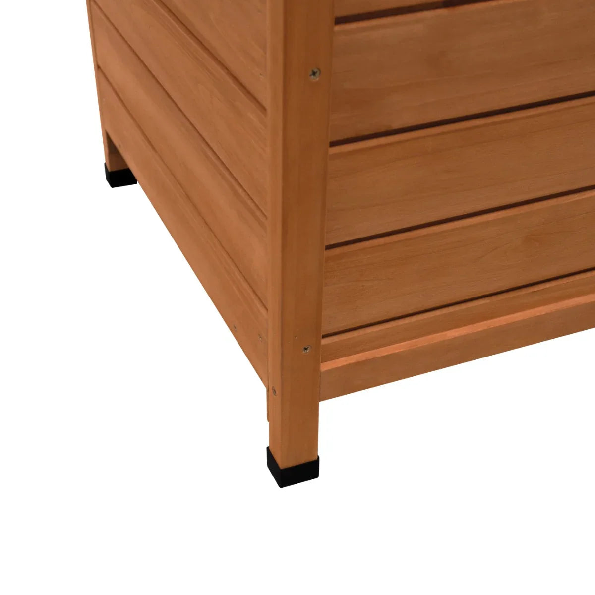 Small wooden dog kennel with a natural wood finish, featuring slatted sides and sturdy black rubber feet for stability