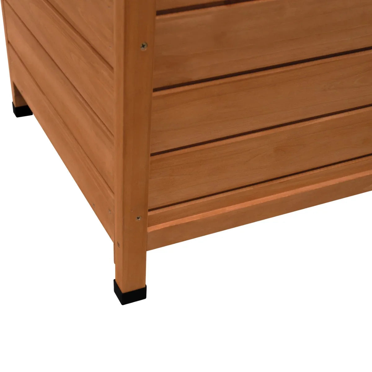 Large dog kennel featuring a sturdy wooden structure with a natural finish, slatted design, and black rubber feet for stability