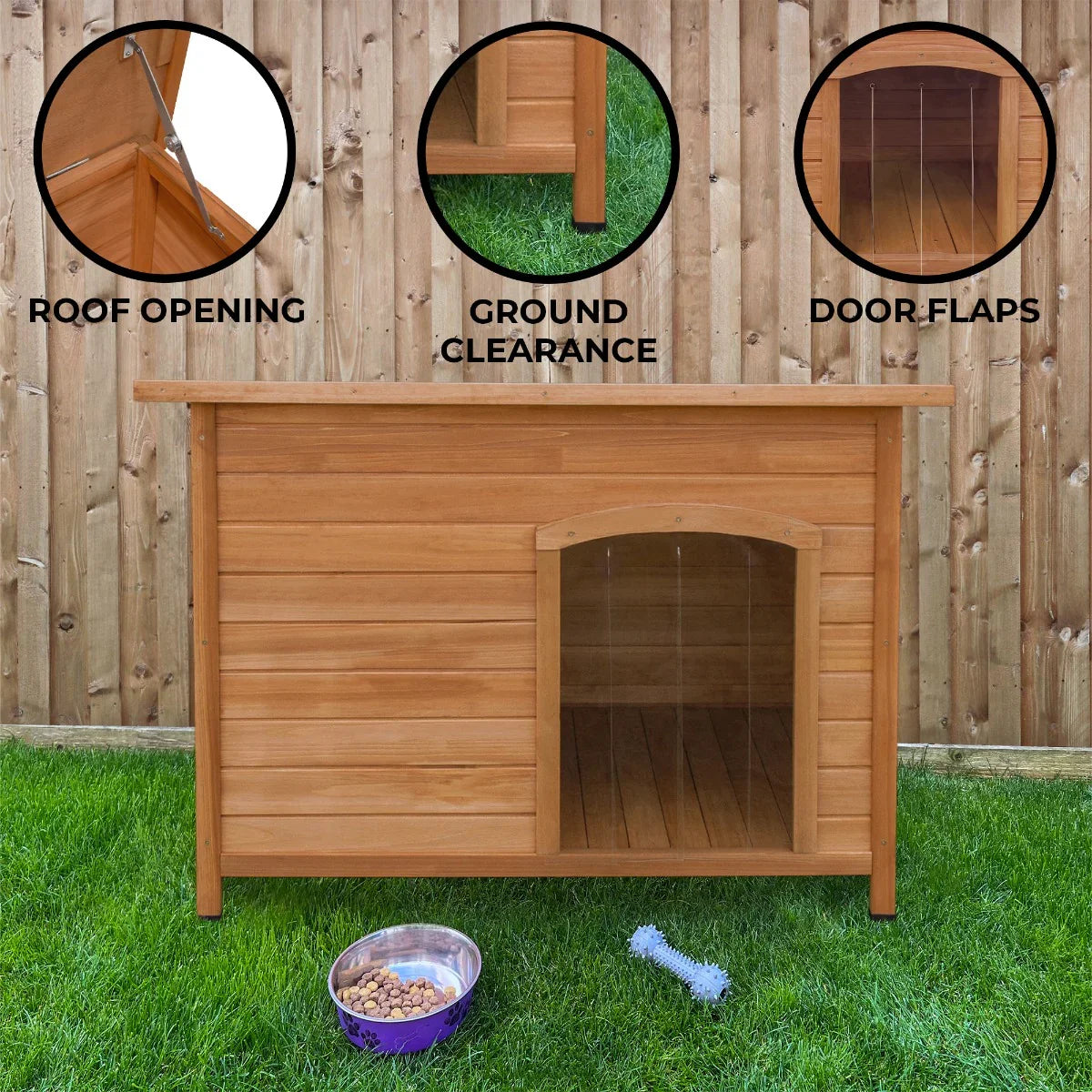 Large wooden dog kennel featuring a roof opening, ground clearance, and door flaps, set on green grass with a bowl and toy nearby
