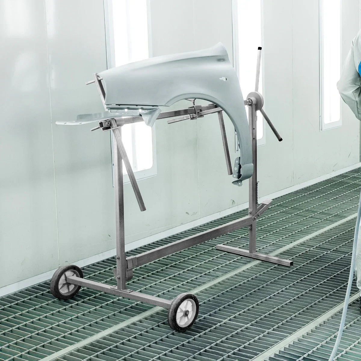 T-Mech Rotary Paint Panel Stand with a light gray car panel mounted, featuring a sturdy metal frame and wheels for easy mobility