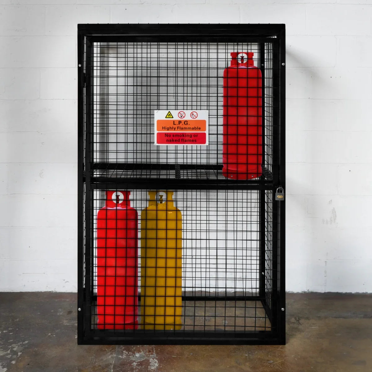 Collapsible mesh cage for gas bottles, featuring a sturdy black frame, red and yellow cylinders inside, and safety warning signage