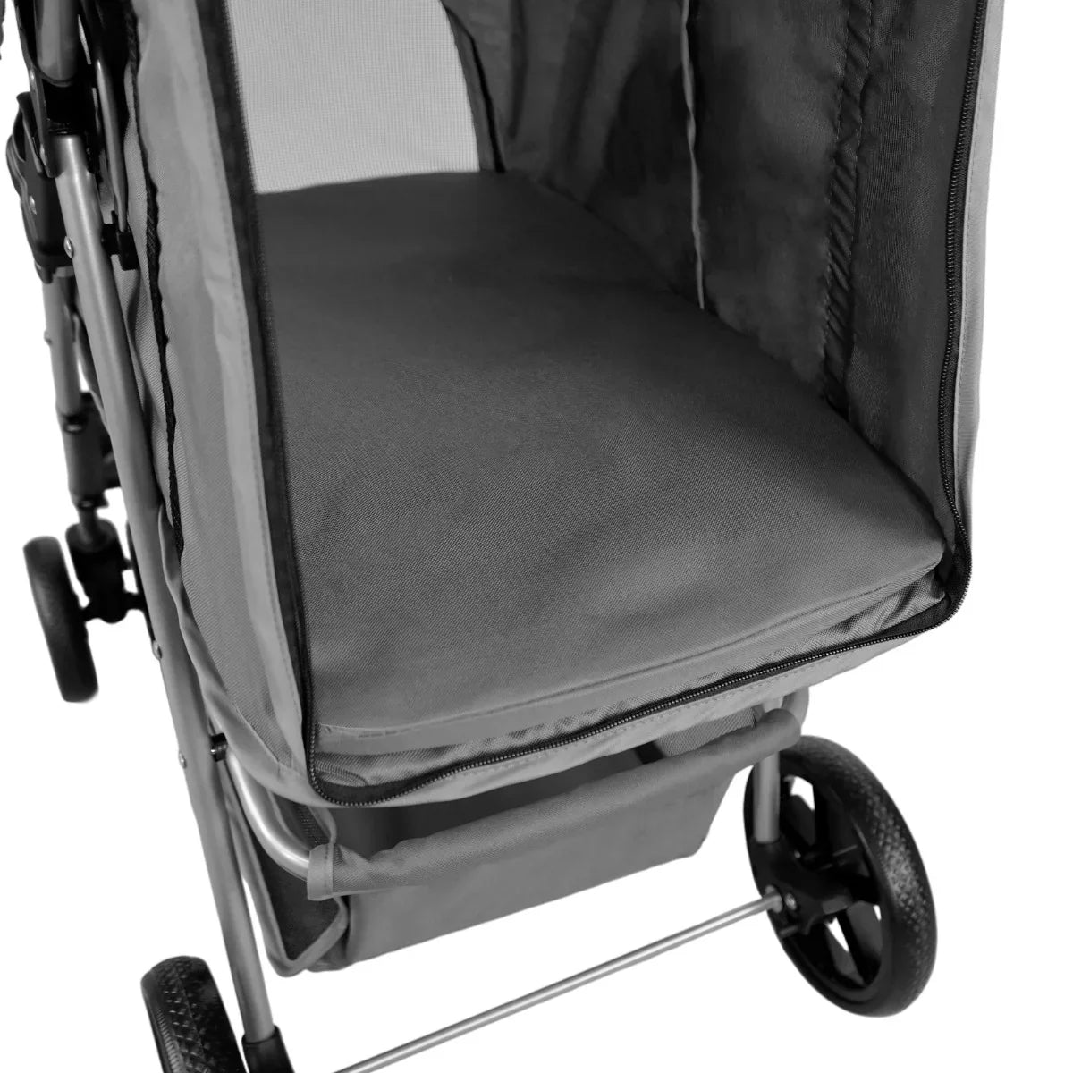 Grey pet stroller featuring a spacious, padded interior, mesh ventilation, and a protective rain cover for added comfort